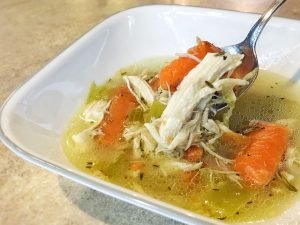 This chicken soup recipe is the granddaddy of all soup recipes! Grab a bowl of this delicious soup straight from the pot or add noodles for a homemade chicken noodle soup. | Tiny Kitchen Cuisine | https://tiny.kitchen